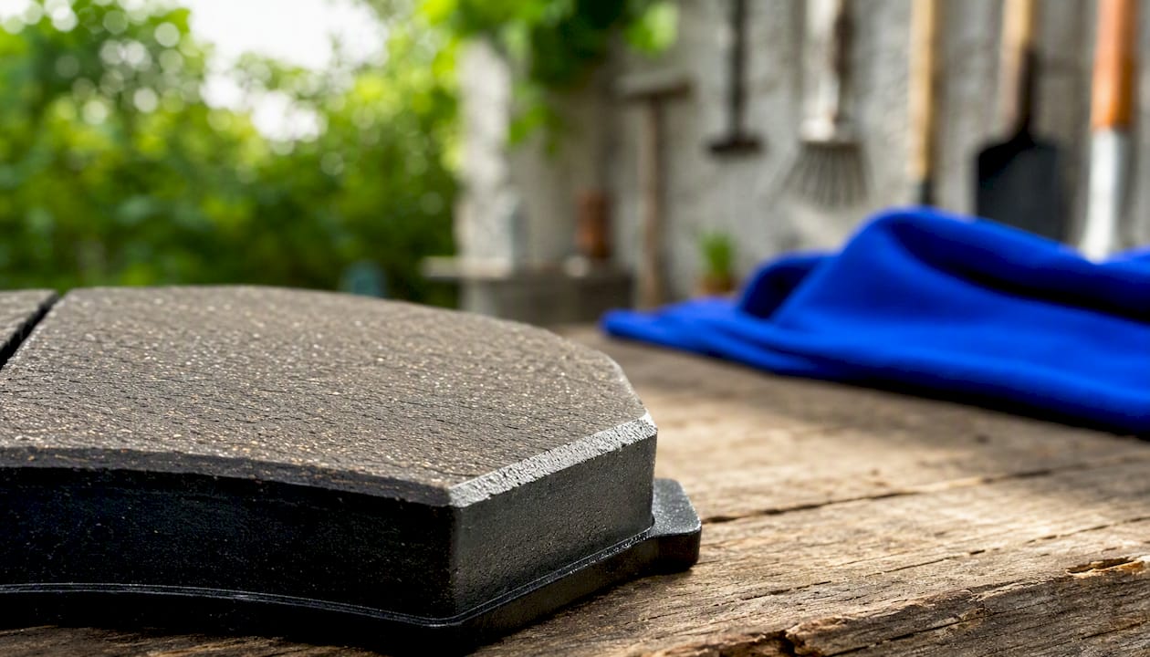 Close-up of chamfered brake pad edge