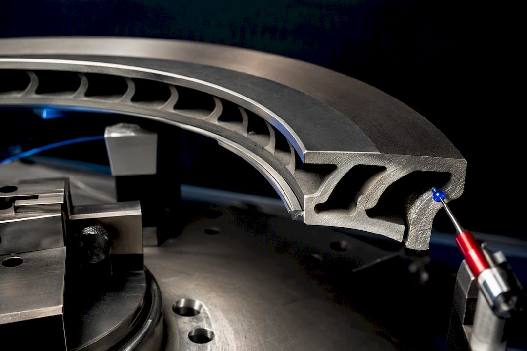 Curved rotor vanes shown in close detail